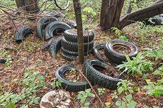 Old Tires outside Abandoned Love Hotel Cosmo