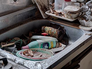 Kitchen sink in abandoned house