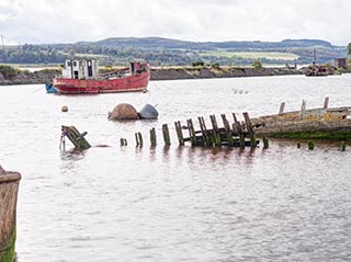 Abandoned Boats and Fishing Boat in Bowling Harbour, Scotland